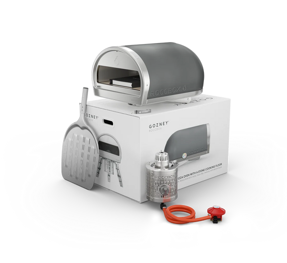 Roccbox comes with oven, gas burner, gas regulator, pizza peel, bottle opener, user manual and recipe book by Gozney | Dual Fuel Option Roccbox comes with oven, gas burner, gas regulator, pizza peel, bottle opener, user manual and recipe book by Gozney | Dual Fuel Option